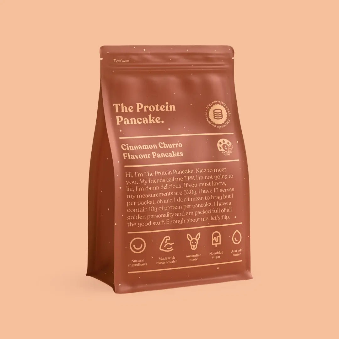 Three bags of flavored protein pancake mix: salted caramel, chocolate, and buttermilk.