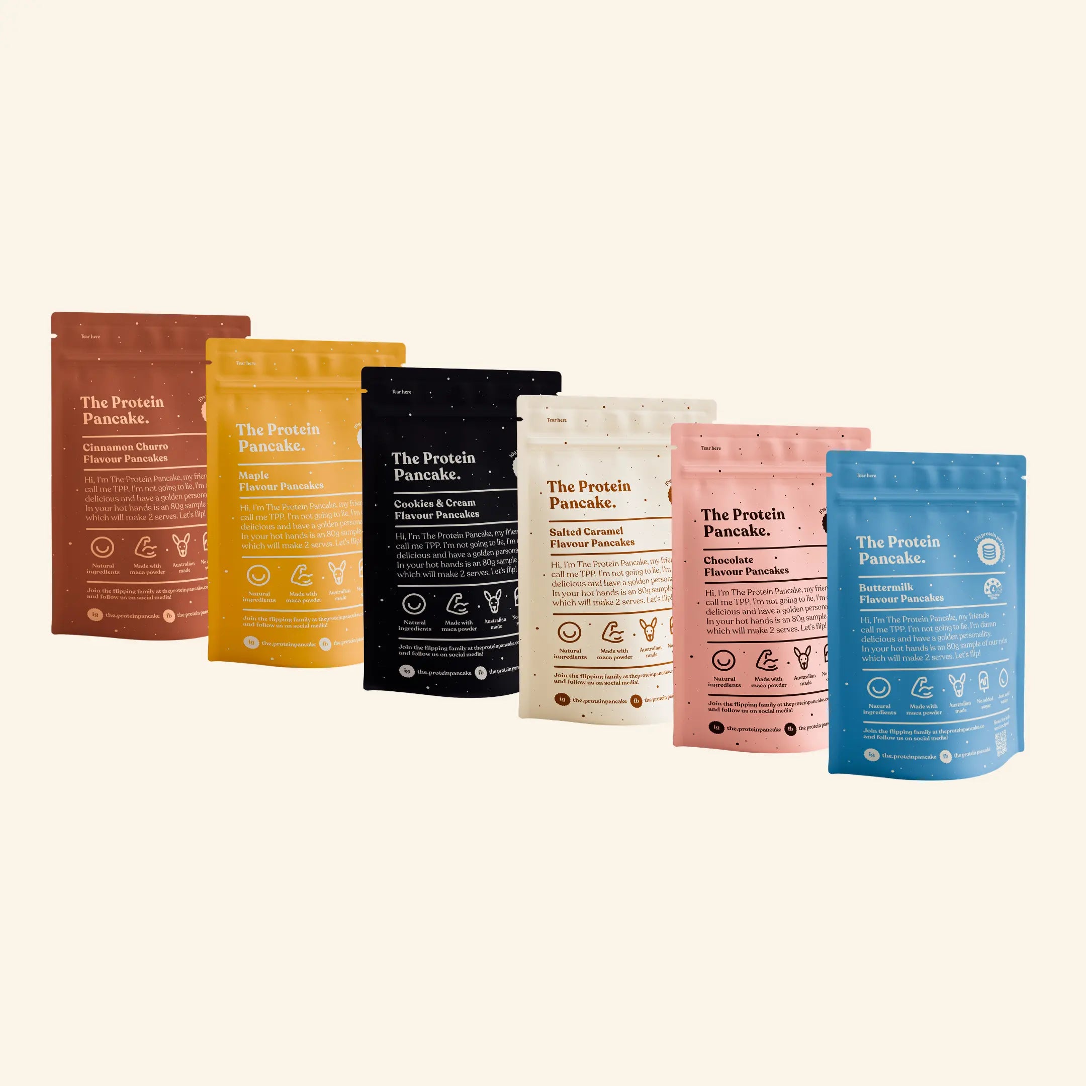 A variety of colorful protein pancake mix bags in different flavors.