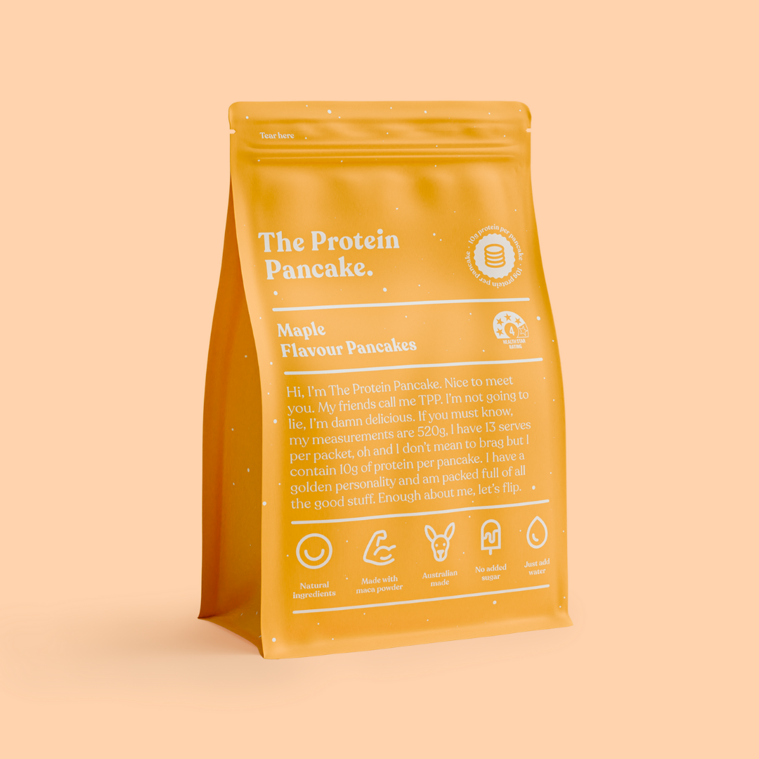 Three bags of flavored protein pancake mix: salted caramel, chocolate, and buttermilk.