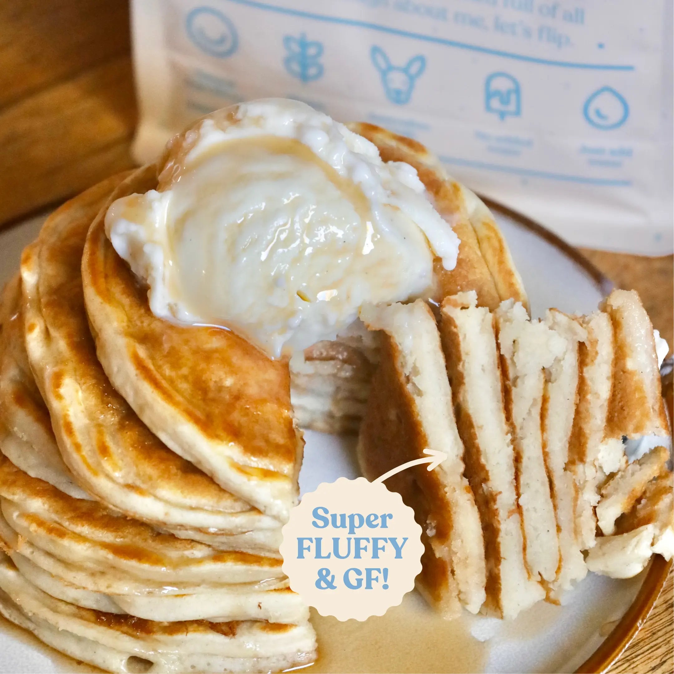 Stack of gluten-free buttermilk protein pancakes with yogurt and Super Fluffy GF badge