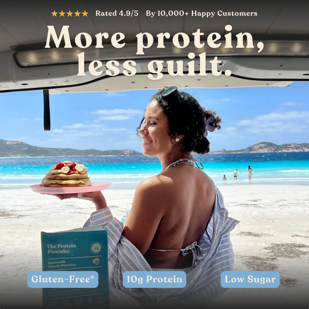 Person enjoying gluten-free gluten free buttermilk protein pancakes at the beach